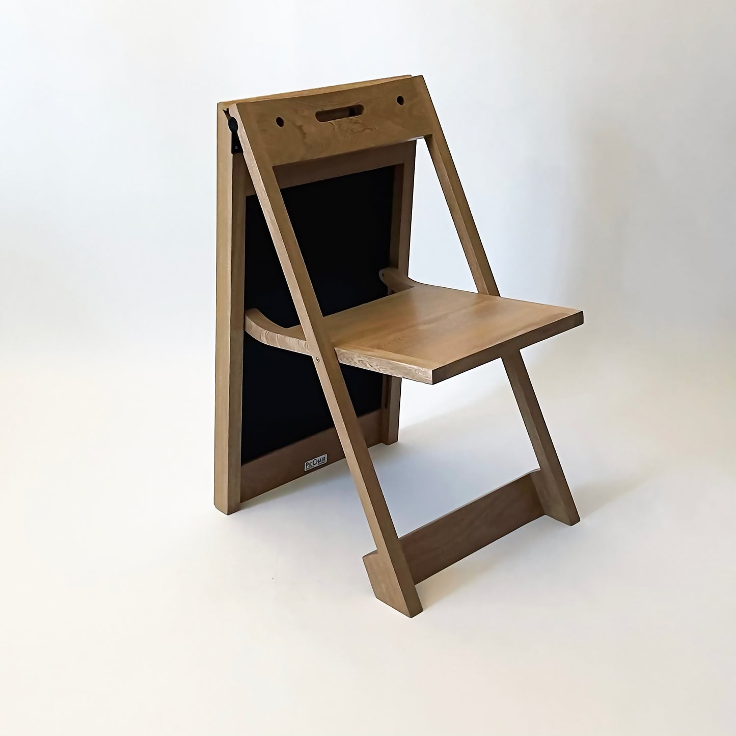 PicChair in natural oak; side view of chair.