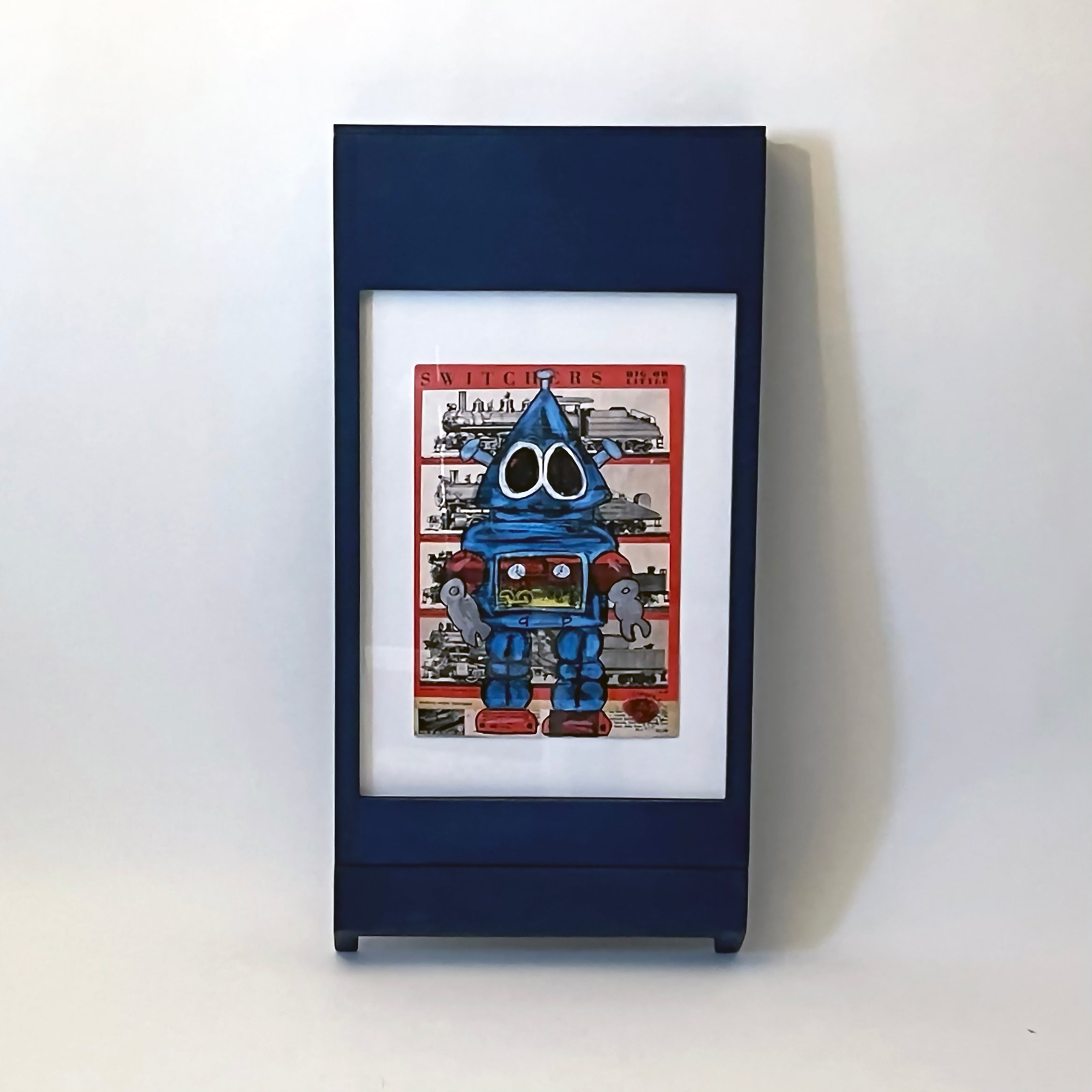 PicChair in blue; view of chair folded up as a frame with art on the wall.