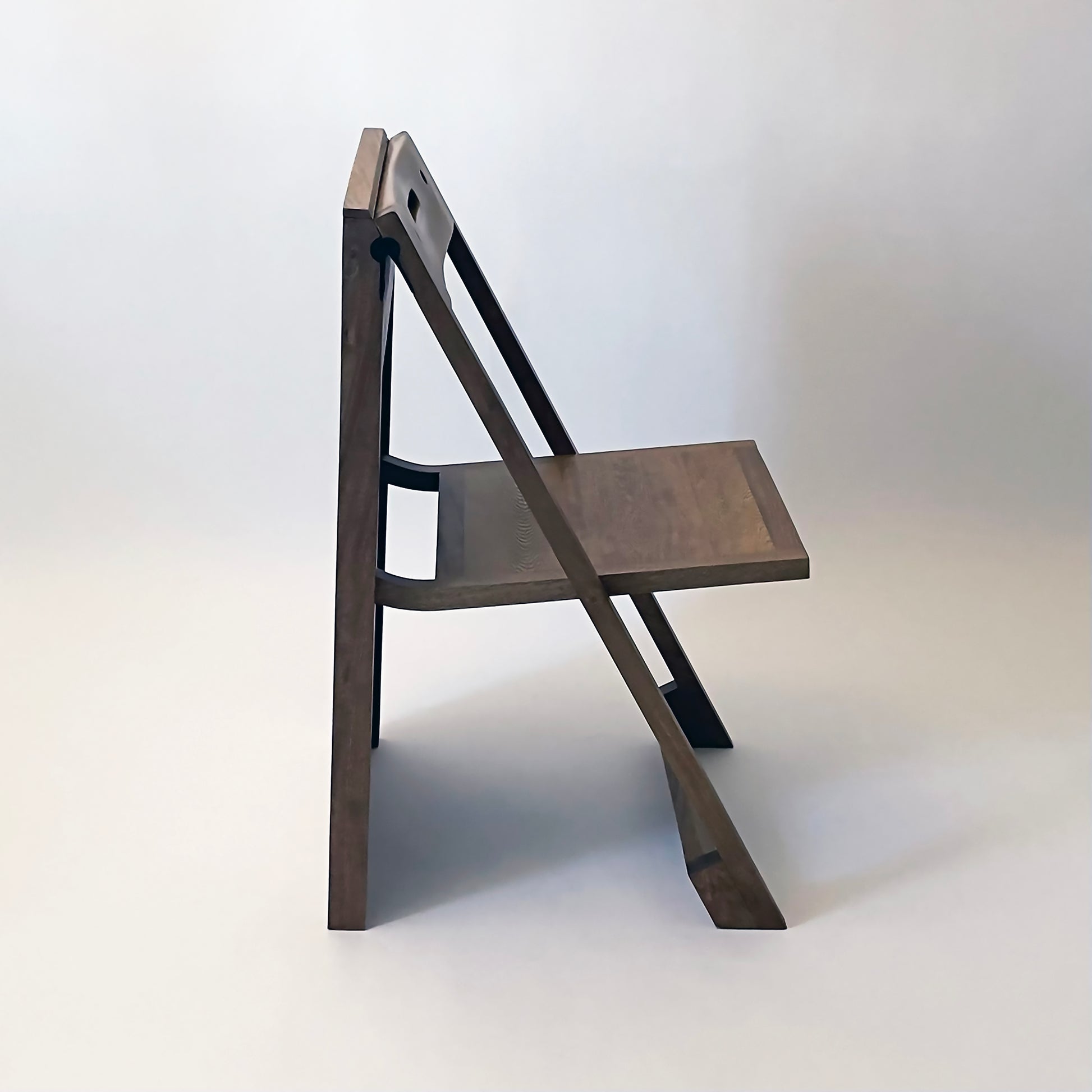 PicChair in dark oak; side view of chair.