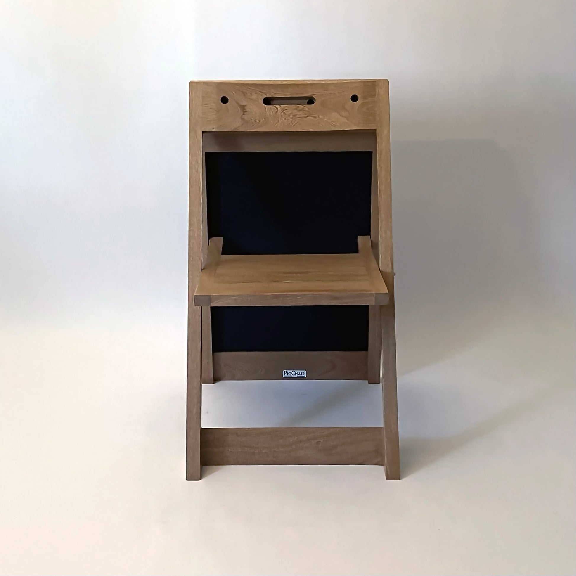 PicChair in natural oak; front view of chair while open.