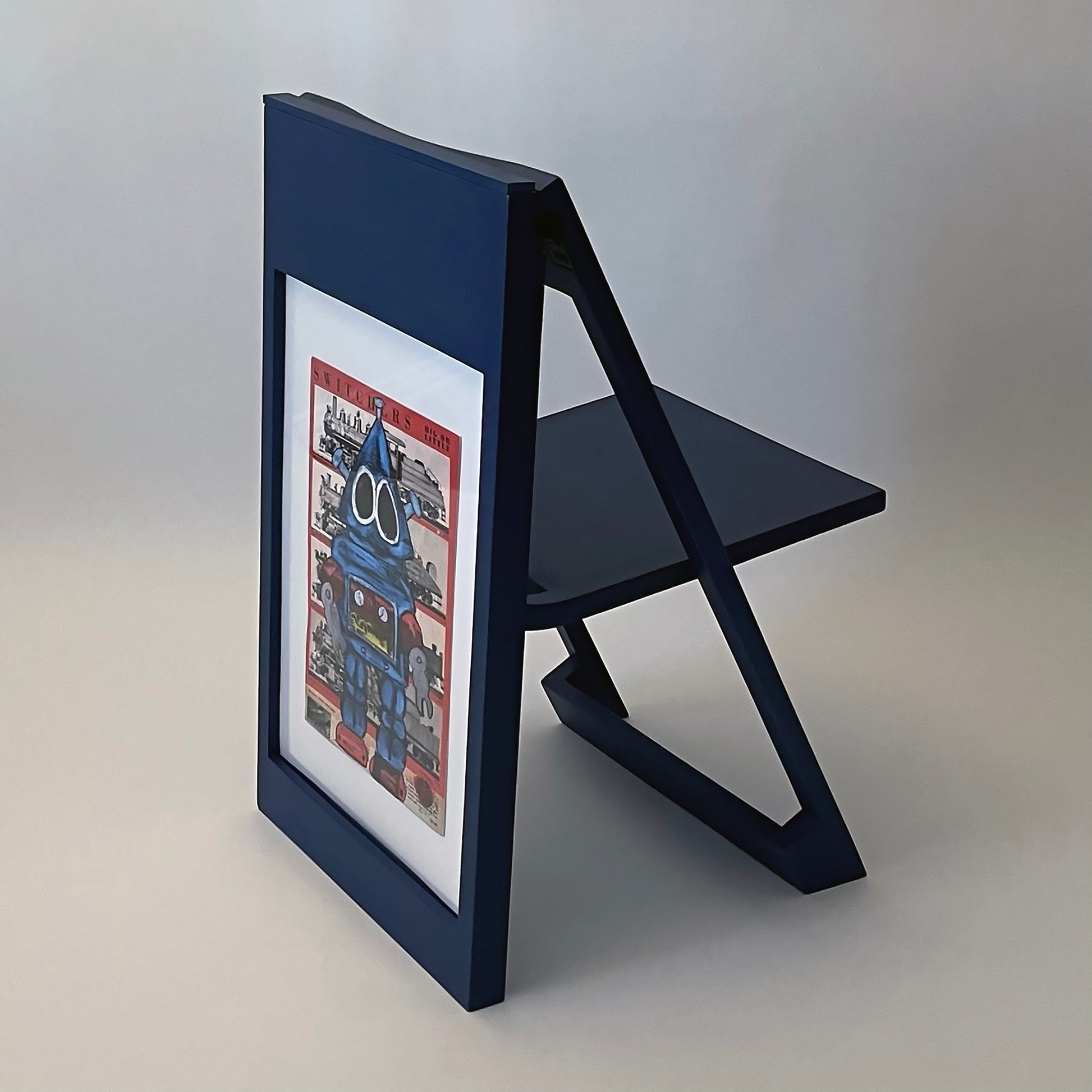 PicChair in Blue; poster on back of chair.